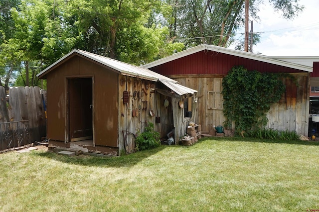 view of shed / structure with a yard