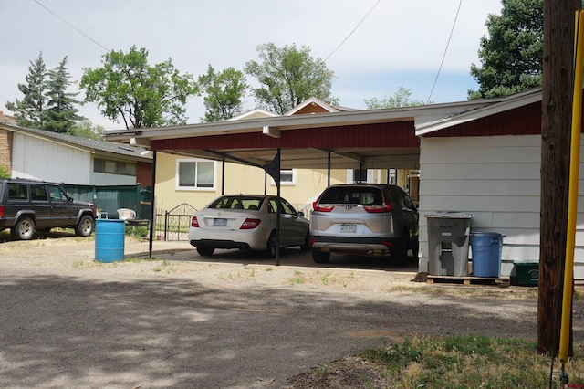 view of parking with a carport