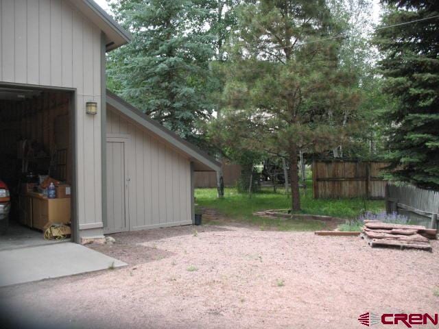 view of yard with a garage