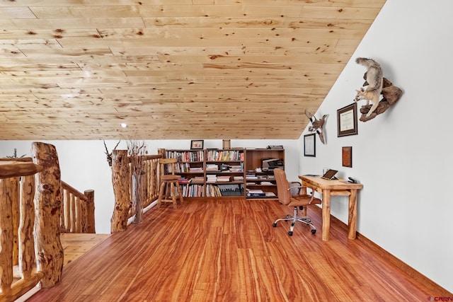 office with light hardwood / wood-style floors, lofted ceiling, and wood ceiling