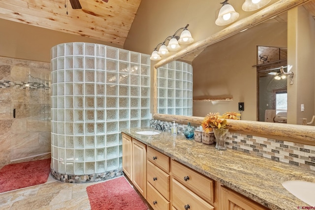 bathroom with wooden ceiling, ceiling fan, and tasteful backsplash