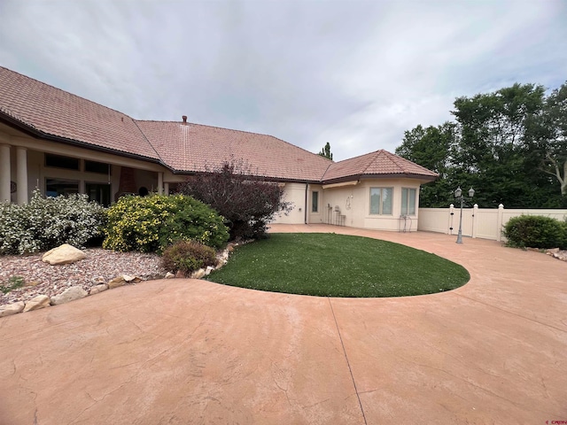 back of house featuring a patio