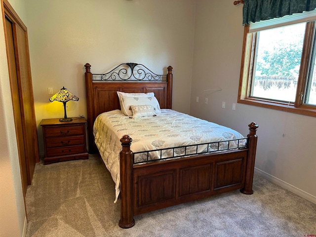 bedroom featuring carpet