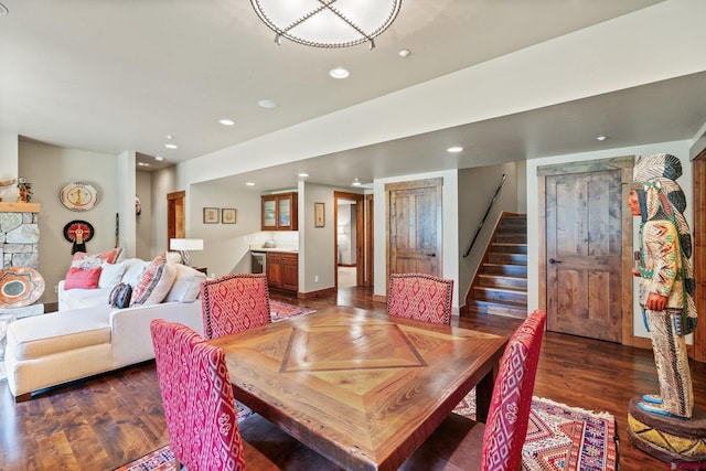 dining area featuring dark wood-type flooring