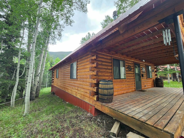 view of home's exterior featuring a deck