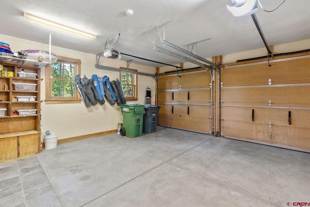 garage featuring a garage door opener