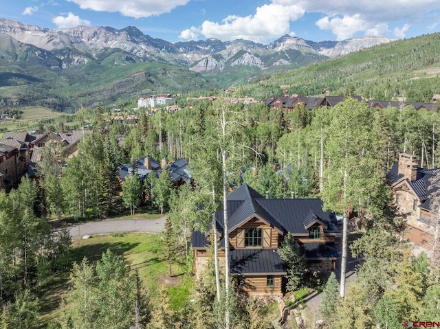 drone / aerial view featuring a mountain view