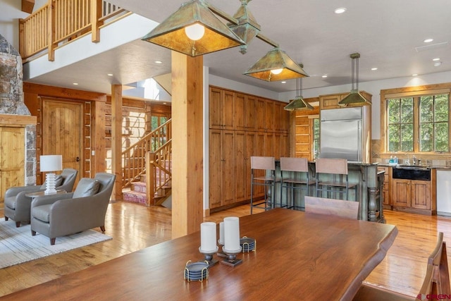 dining room featuring light hardwood / wood-style floors and sink