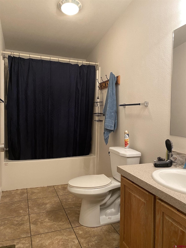 full bathroom with tile patterned flooring, vanity, toilet, and shower / bathtub combination with curtain