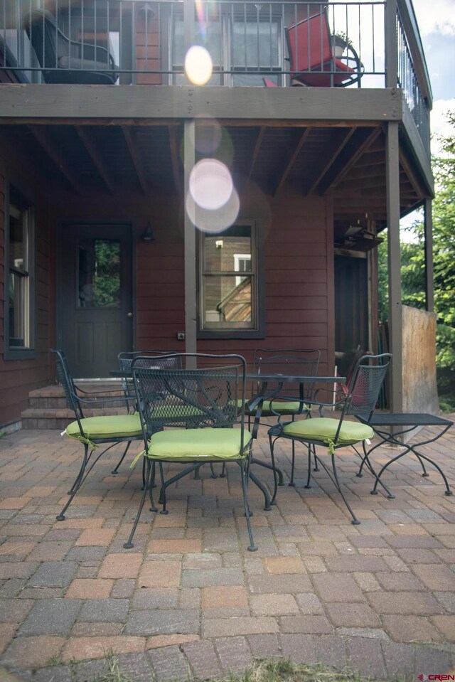 view of patio / terrace with a balcony