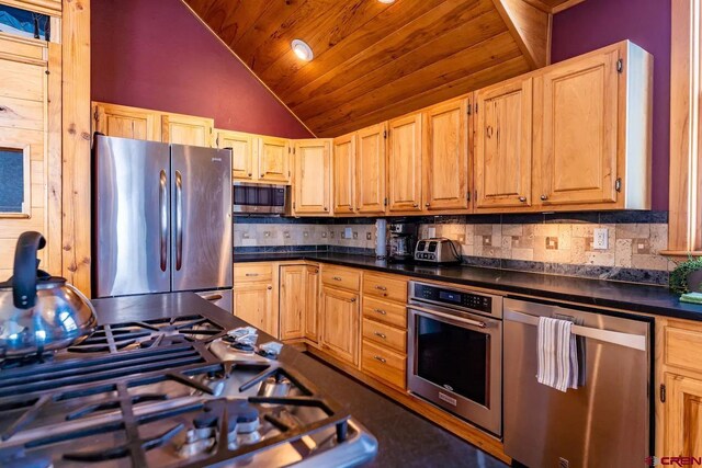 kitchen featuring appliances with stainless steel finishes, tasteful backsplash, high vaulted ceiling, and wood ceiling