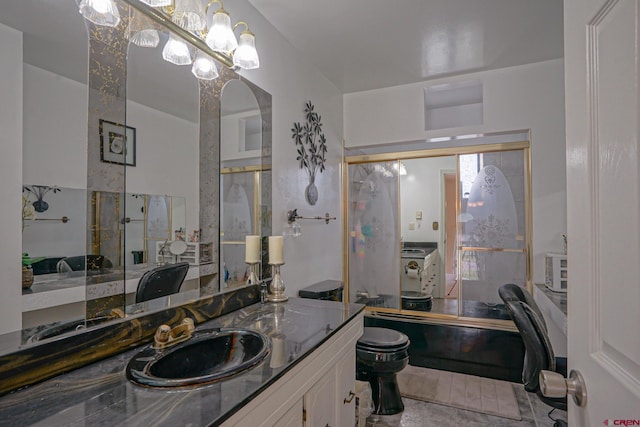 bathroom with vanity and tile patterned floors