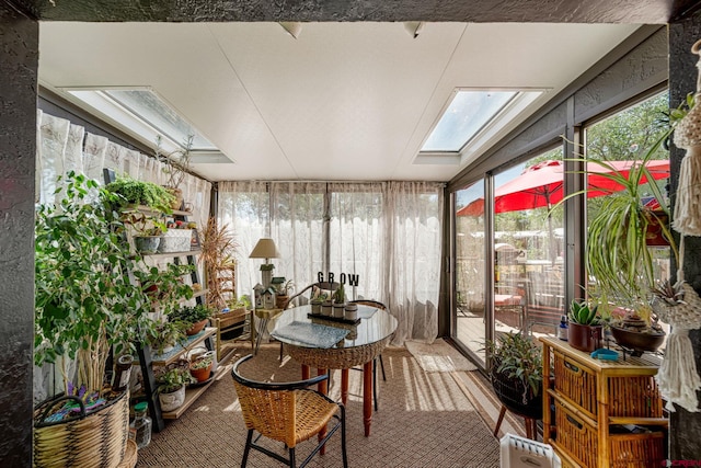 sunroom featuring a skylight