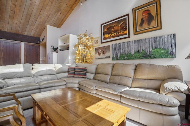 carpeted living room with high vaulted ceiling and wooden ceiling