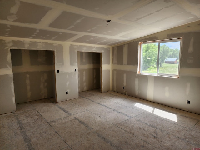 interior space featuring vaulted ceiling