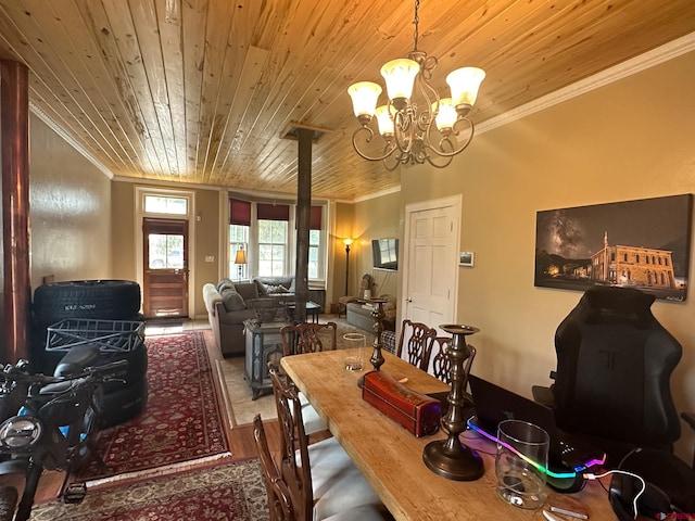 dining area with a notable chandelier, ornamental molding, and wooden ceiling