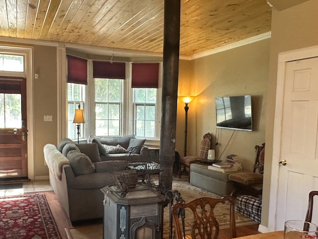 living room featuring wood ceiling, crown molding, and light hardwood / wood-style floors