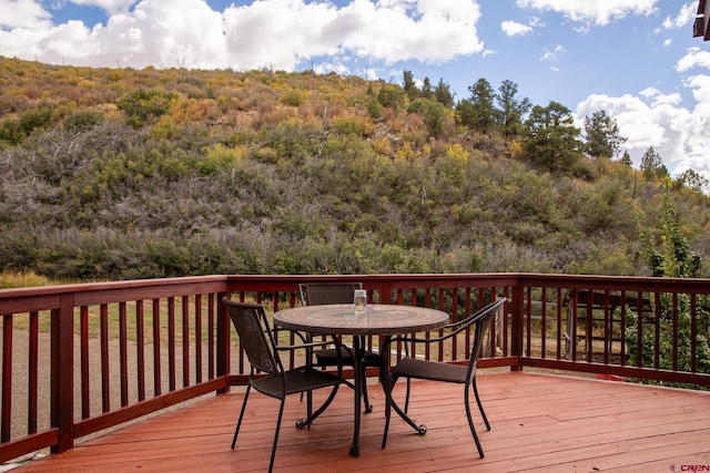 deck with a wooded view