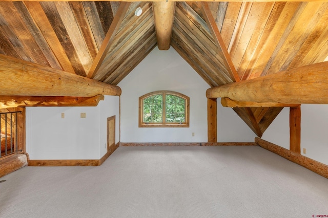 bonus room featuring carpet floors and lofted ceiling with beams