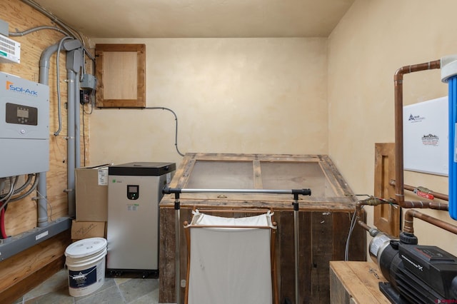 washroom with tile patterned floors