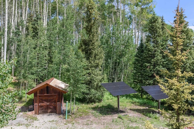 view of community featuring a shed