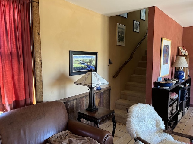 sitting room featuring light hardwood / wood-style flooring