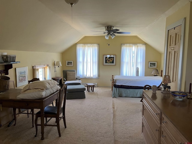 carpeted bedroom featuring ceiling fan, lofted ceiling, and multiple windows