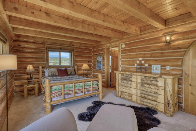 bedroom with wood ceiling, log walls, and beamed ceiling