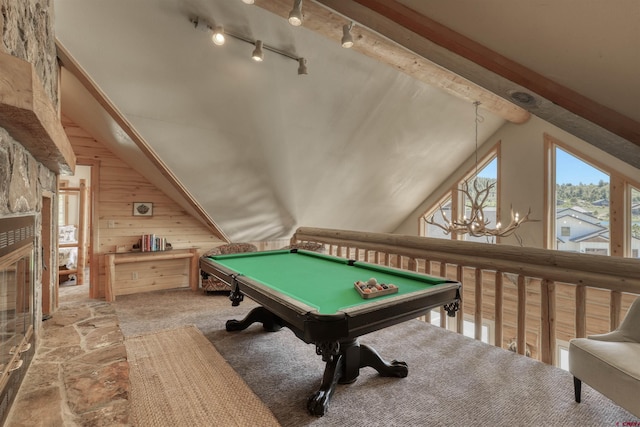 game room with lofted ceiling, billiards, light colored carpet, and wood walls