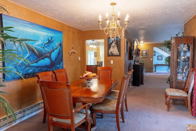 dining space with a baseboard heating unit, carpet floors, and an inviting chandelier