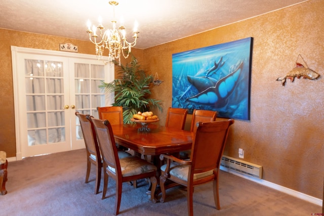 dining room featuring carpet floors, baseboard heating, a chandelier, and a textured ceiling