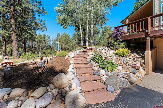 view of yard with a wooden deck