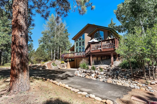 exterior space featuring a wooden deck