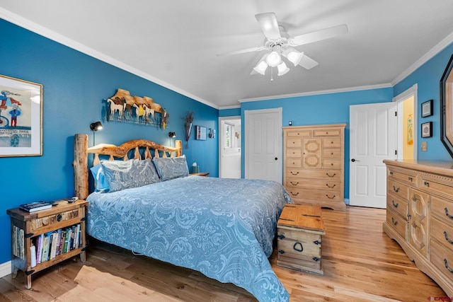 bedroom featuring ceiling fan, light wood-type flooring, and ornamental molding