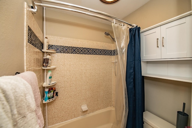 bathroom with shower / tub combo