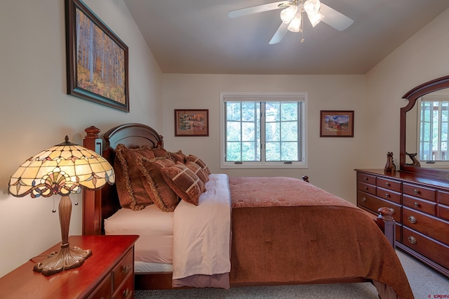 bedroom featuring ceiling fan and carpet floors