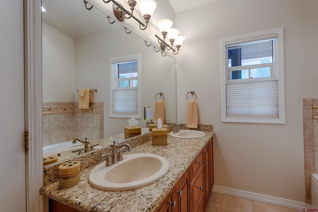 bathroom featuring a bath, vanity, and tile patterned floors