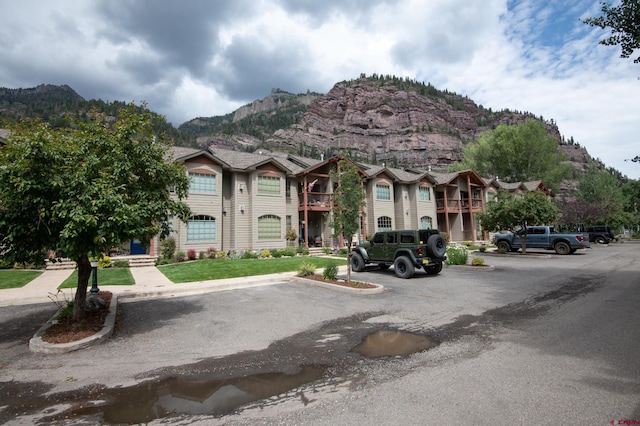 exterior space featuring a mountain view