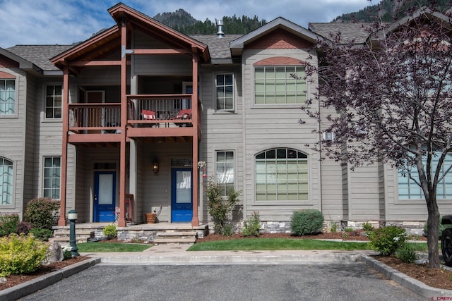 view of property featuring a balcony