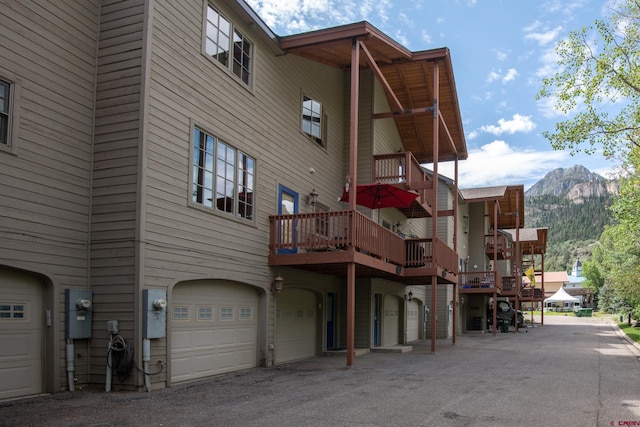 view of building exterior with a mountain view