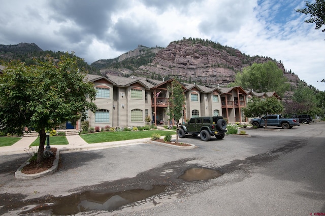 88 4th Ave Unit 3, Ouray, CO 81427 - view of front of house with uncovered parking and a mountain view