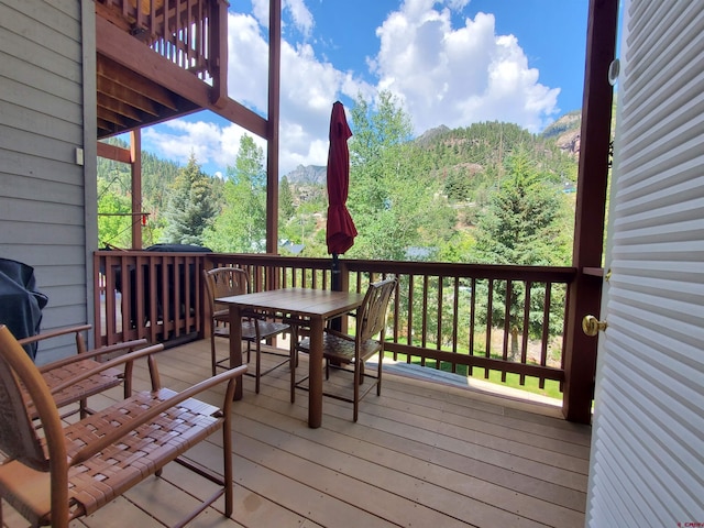 88 4th Ave Unit 3, Ouray, CO 81427 - deck featuring a view of trees and outdoor dining space