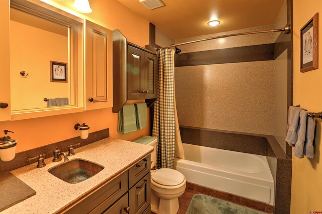 full bathroom featuring vanity, toilet, shower / bath combo, and tile patterned flooring