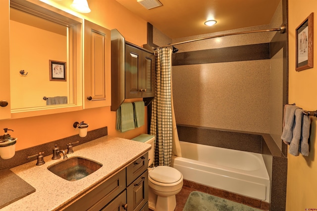 bathroom featuring visible vents, shower / tub combo with curtain, vanity, and toilet