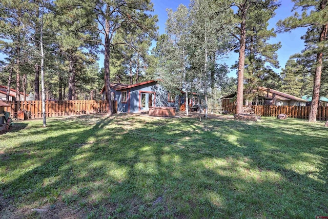 view of yard featuring a fenced backyard