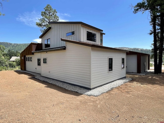 view of side of property featuring board and batten siding