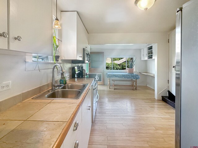 dining space featuring light hardwood / wood-style flooring