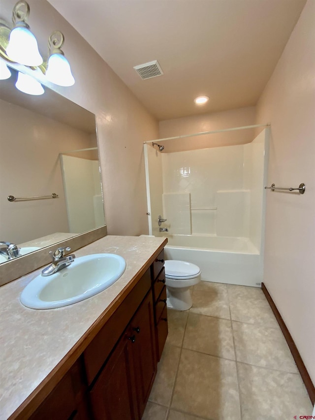 full bathroom with tile patterned floors, vanity, toilet, and tub / shower combination