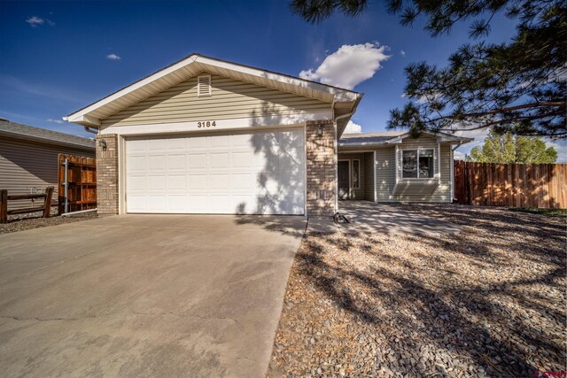 ranch-style house with a garage