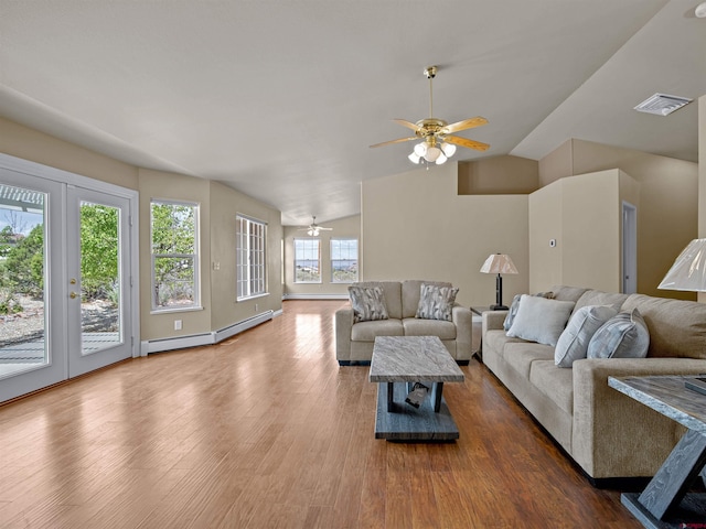 living room featuring lofted ceiling, ceiling fan, wood-type flooring, a baseboard radiator, and french doors